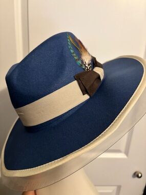 Navy Blue Wide-Brim Fedora with Cream Band and Feather